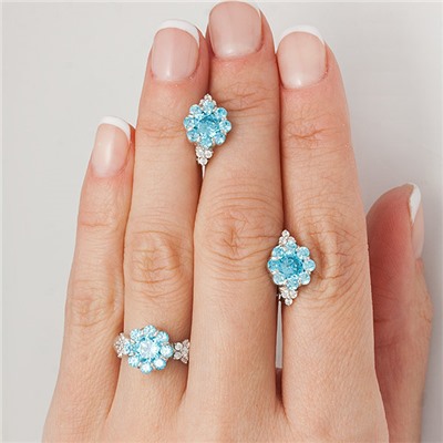 Серебряное кольцо с фианитами голубого цвета 140
